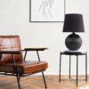 Picture frame with line art by a reading coffee table in a livin Naktinis šviestuvas Santana Black 1