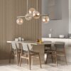 Modern living room in beige tones and wooden wall details, sofa, Pakabinamas šviestuvas Estera Gold 5